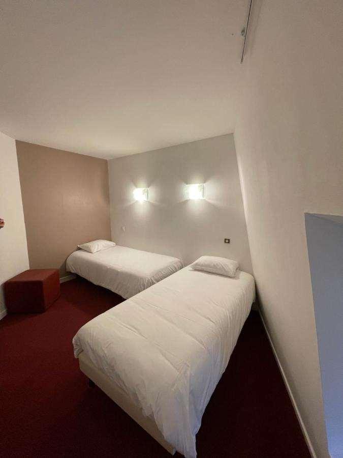 Brit Hotel Le Lion D'Or שינון חדר תמונה