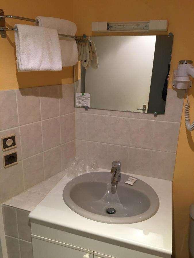 Brit Hotel Le Lion D'Or שינון חדר תמונה