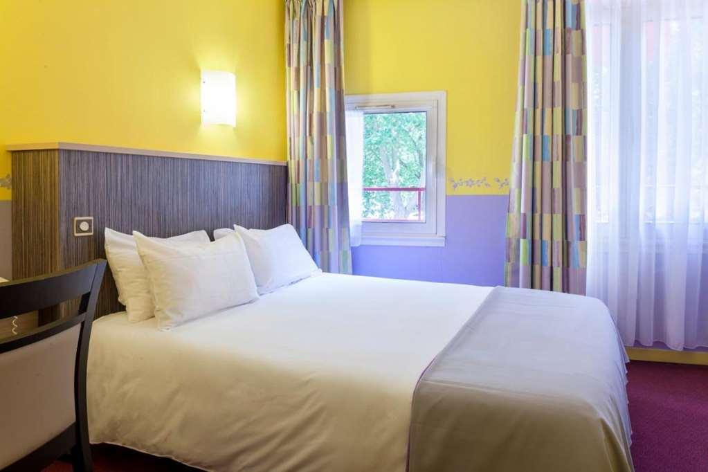 Brit Hotel Le Lion D'Or שינון חדר תמונה