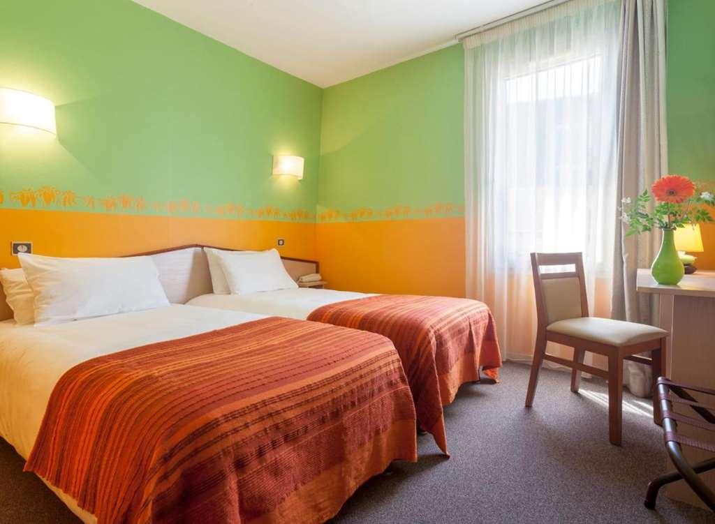 Brit Hotel Le Lion D'Or שינון חדר תמונה